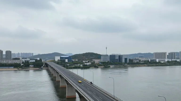 Illustration for: North Korean leader crosses new border bridge to China